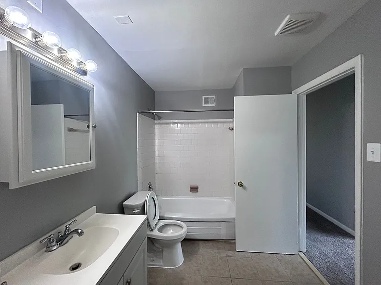 901 Woodson Rd — Photo 6