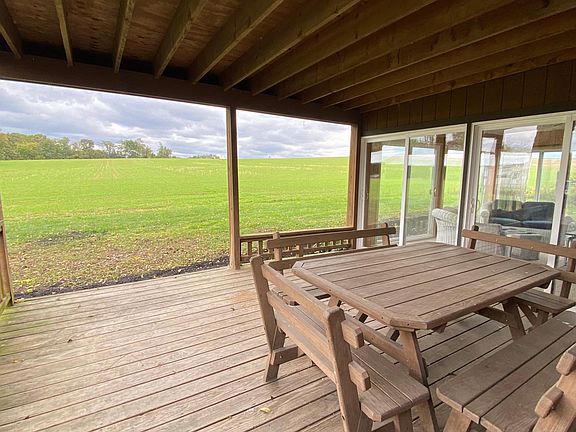Covered porch looking out to the fields.