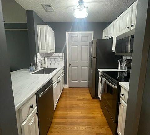 3rd image of 1075 Peachtree Walk NE Unit A302