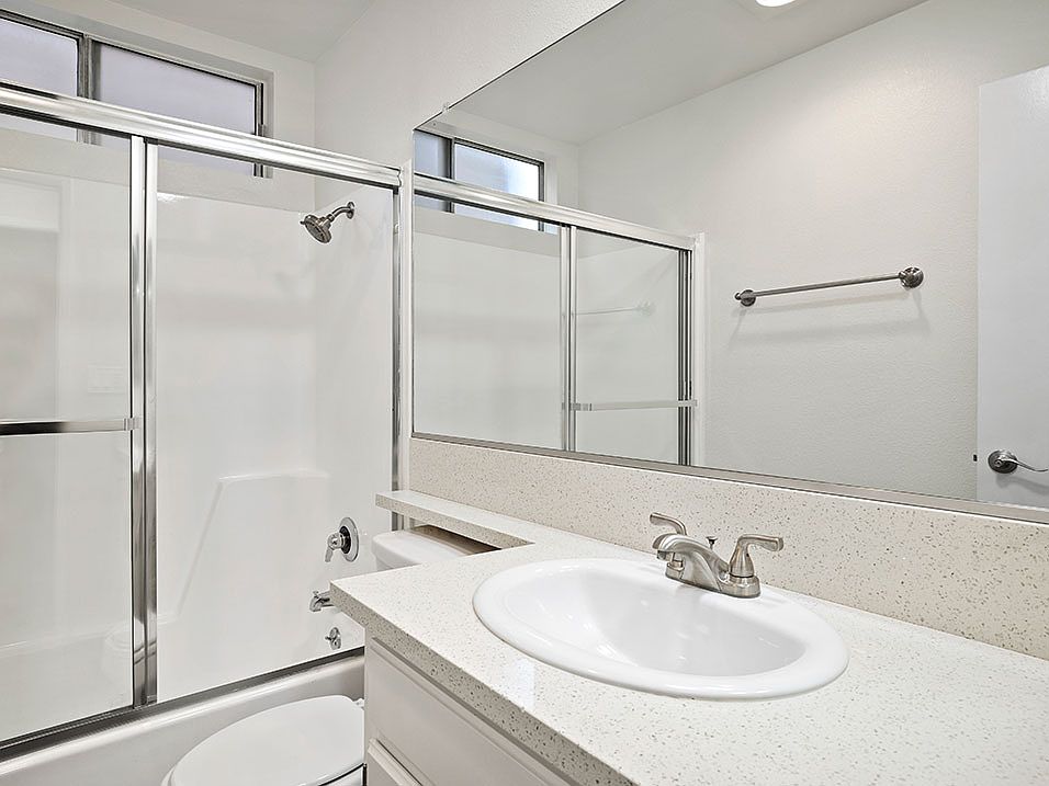 Modern styled bathroom with shower and tub.