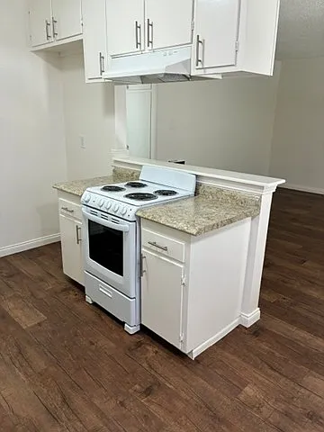 Modern Stove and Exhaust Fan. New Refrigerator Delivered upon Move-In