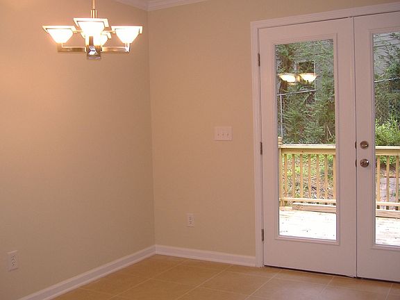 Eat in Kitchen with French Doors leading to back deck.