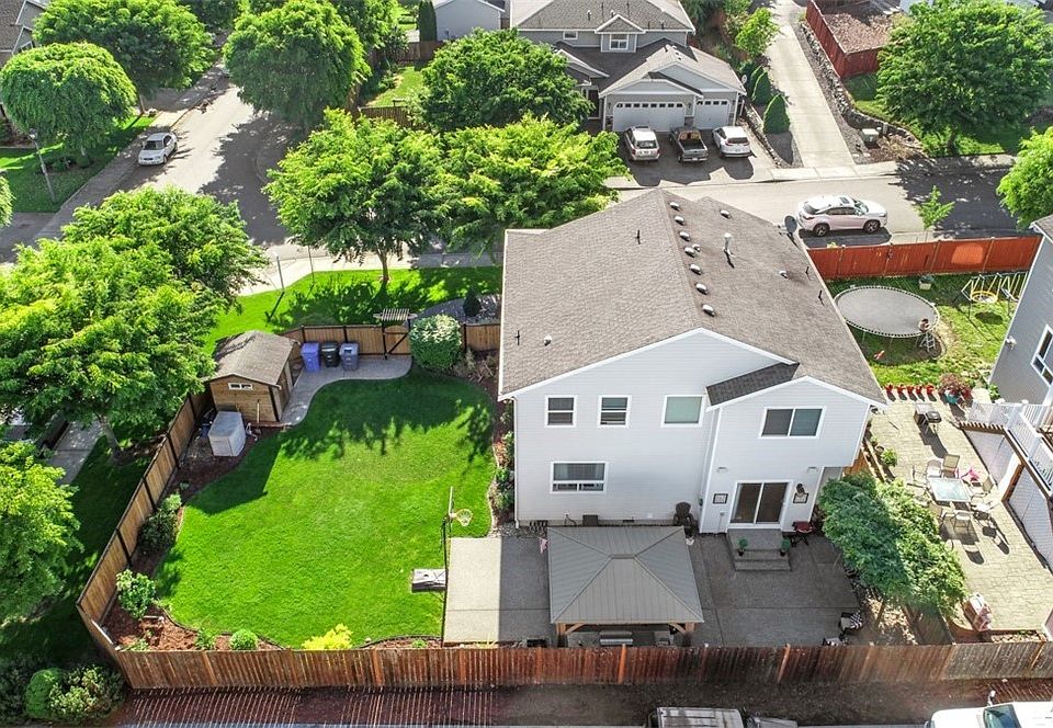 This Gorgeous home in manicured inside and out. Extra over-sized  Patio for entertaining with all of the Bells & Whistles . Extended driveway and walkways. Office Space over Garage currently being used as 4th Bedroom. Come see this one Today .  