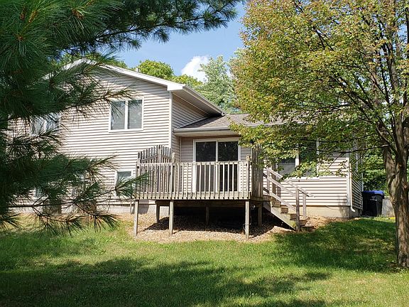 Deck off back of house to shady private yard