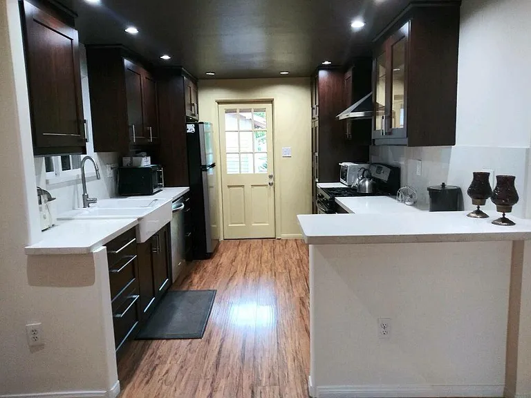 Kitchen with bar seating.