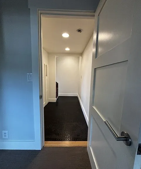 Looking out from the bedroom into the hallway.