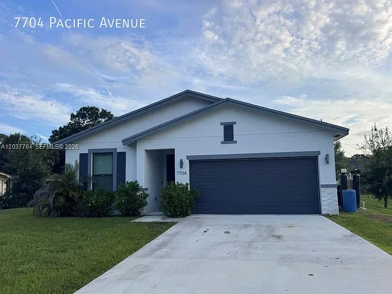 7704 Pacific Ave — Photo 1