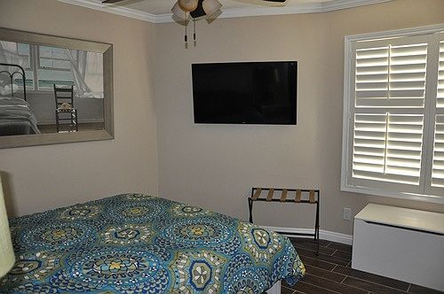 2nd bedroom with tv and large closet