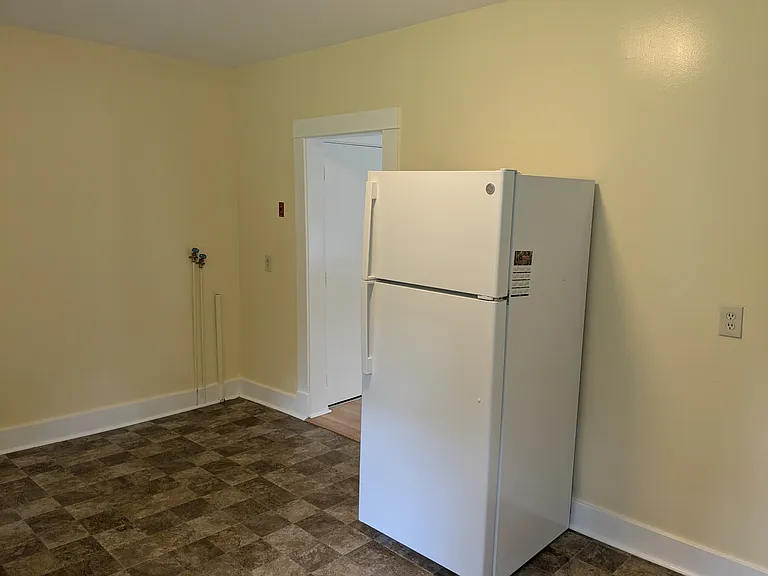 washer hookup, refrigerator and electric stove.