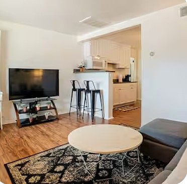 Living room with a view of the kitchen