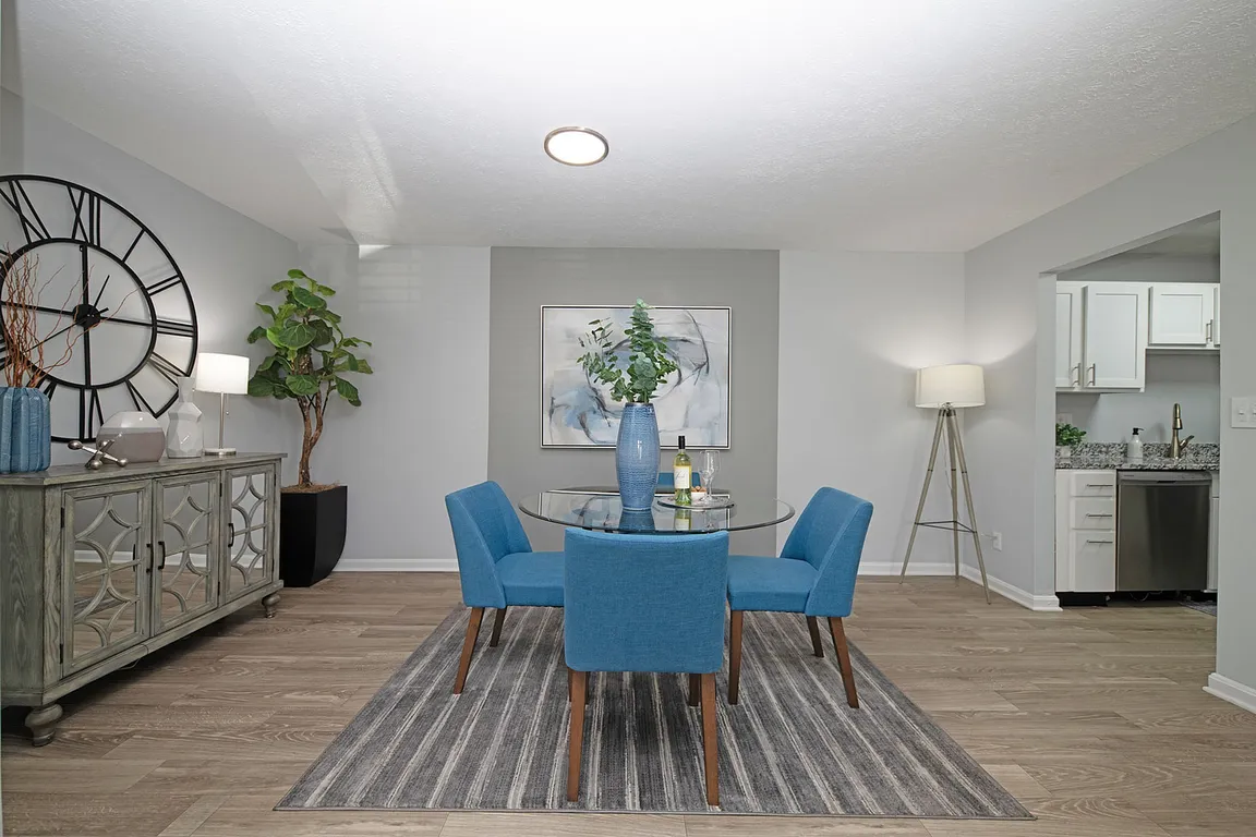 Dining area with hardwood-style flooring