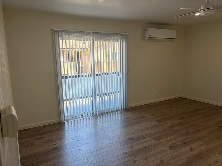Living Room with Outdoor Balcony