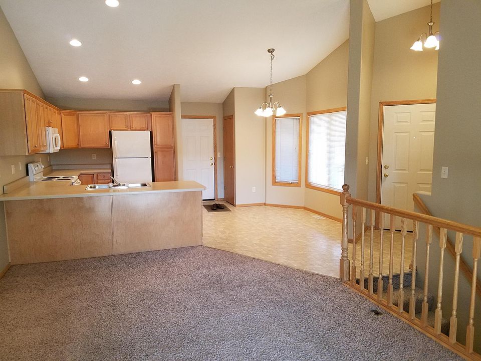Vaulted ceilings in kitchen, dining area and living room.