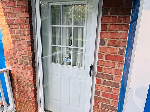 Front door of your nest is around the chimminey stack.