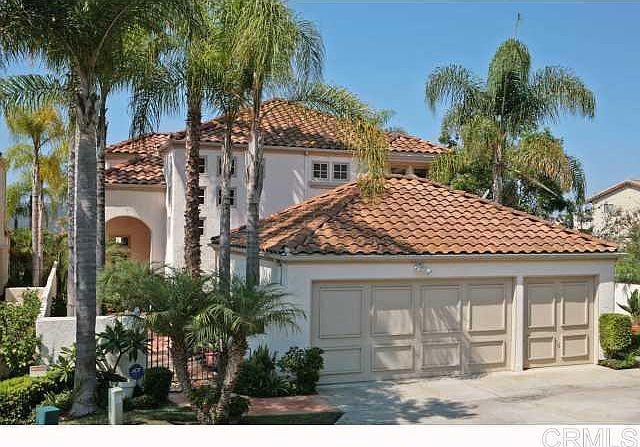 Note new garage doors since photo taken.