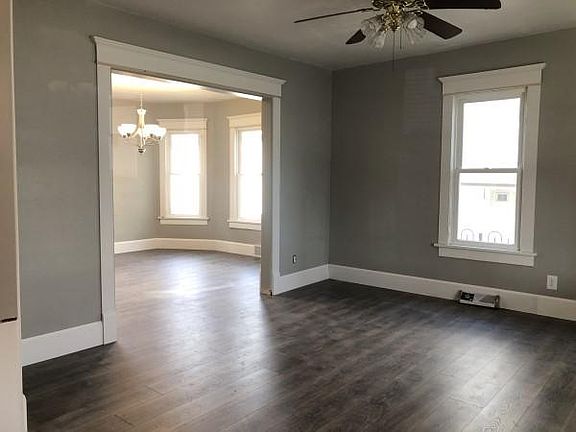 Large living room with beautiful trim