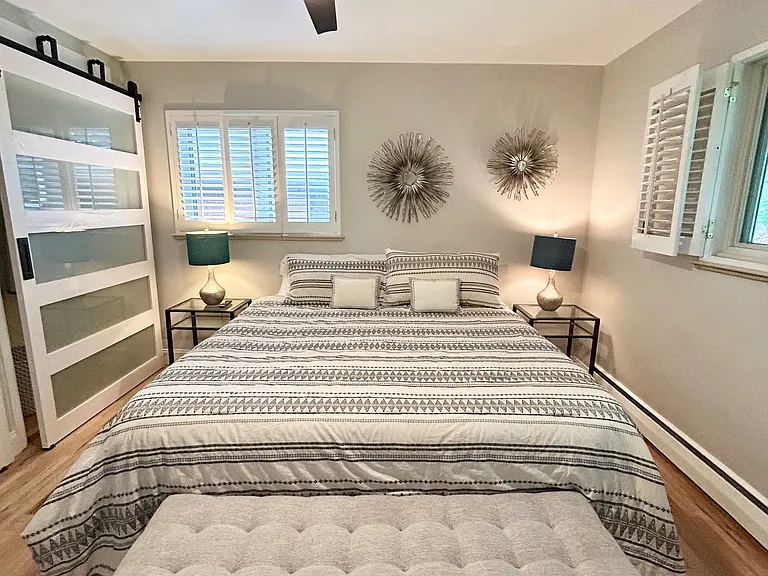 Master bedroom king adjustable bed with remote & ceiling fan. 
Smart TV and double closet and en suite bathroom