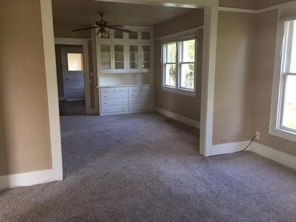 Dining/Living room with built in hutch.