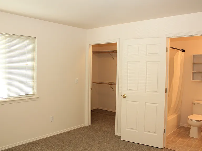 Guest Suite with HUGE Walk in Closet & Private Entry to Guest Bath.