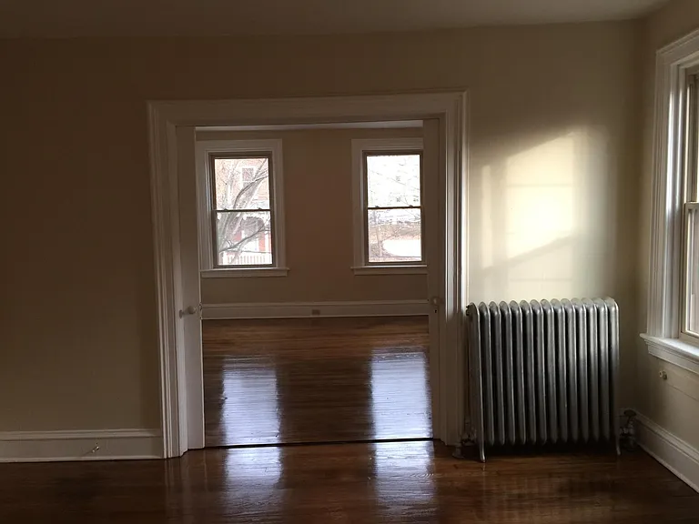 Living Room with pocket doors to Bedroom