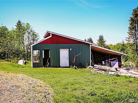 Pump-house has 3500 gallon holding tank and property has two drilled wells to supply it.  The small greenhouse on southern wall is one of 3 freshly painted greenhouses/potting sheds and has wood storage.