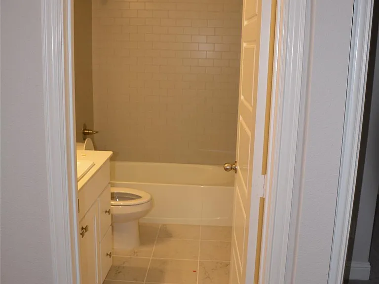 TWO FULL BATHROOMS PLUS A HALF BATHROOM