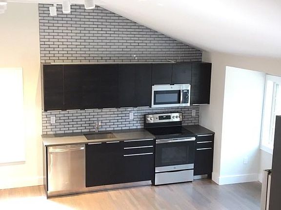 All New Tiled Back Splash with Lighting