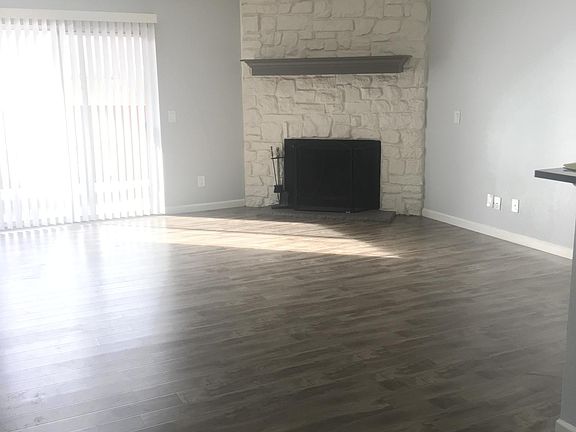 Beautiful wood burning fireplace in living room.