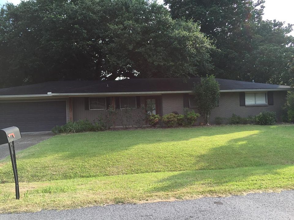 The front (there is a new mailbox and the landscaping is gone.)