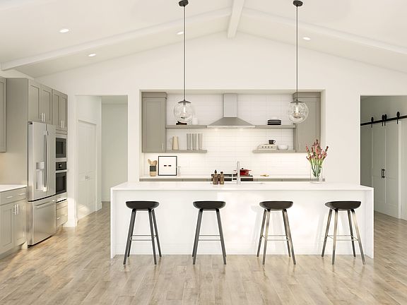 Kitchen with pendant lighting and floating shelves