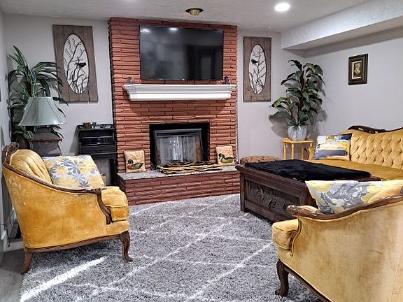 Living room open area to kitchen and dinning area. With french doors to outside patio area.