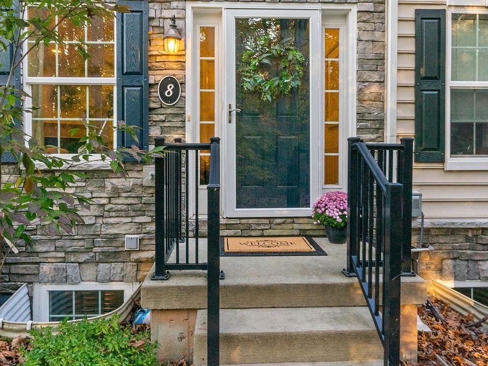 Private front entryway facing wooded area