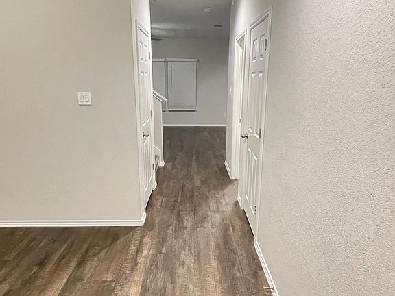 Front entrance leading to stairs & living room