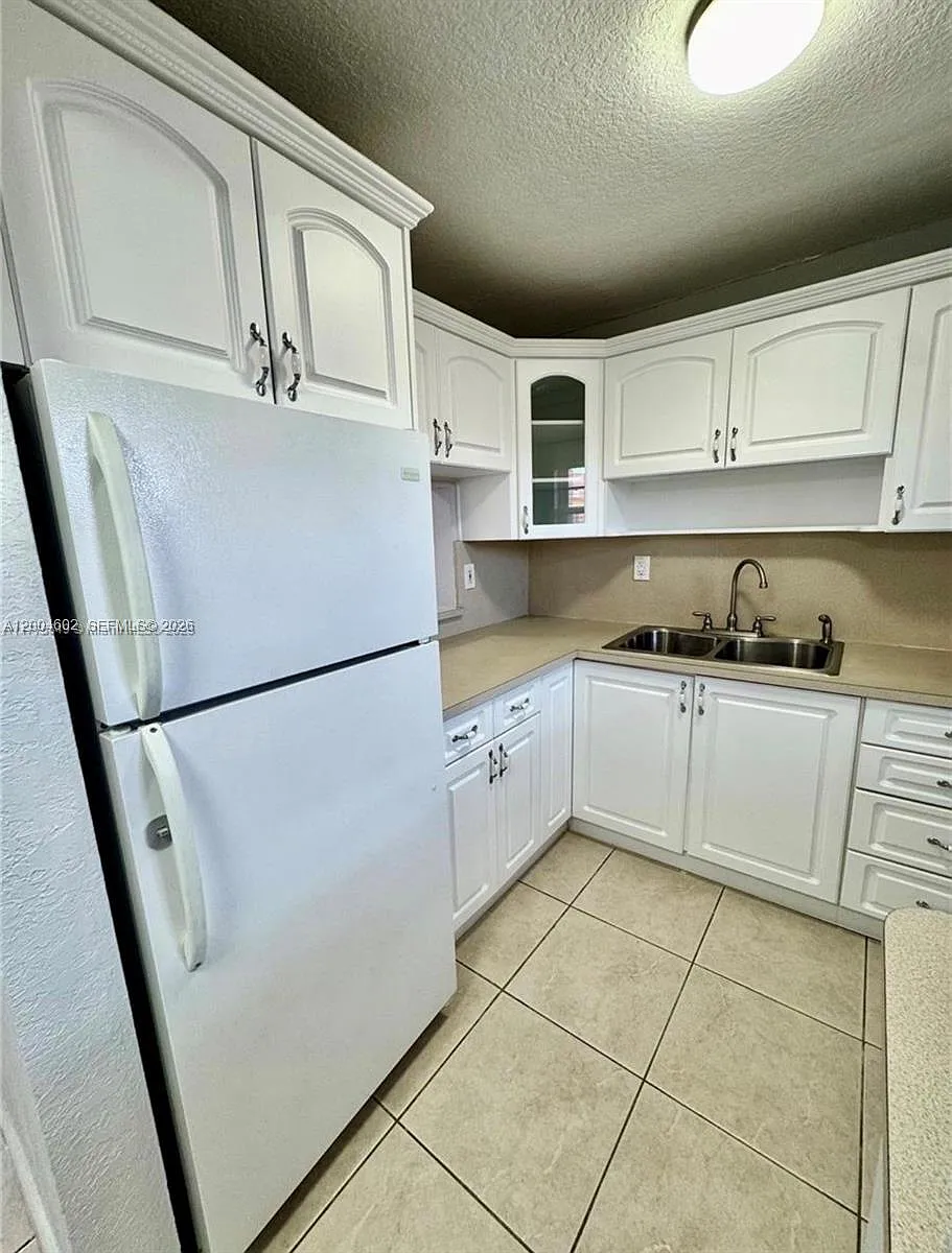 Building Photo - 1855 W 60th St #446