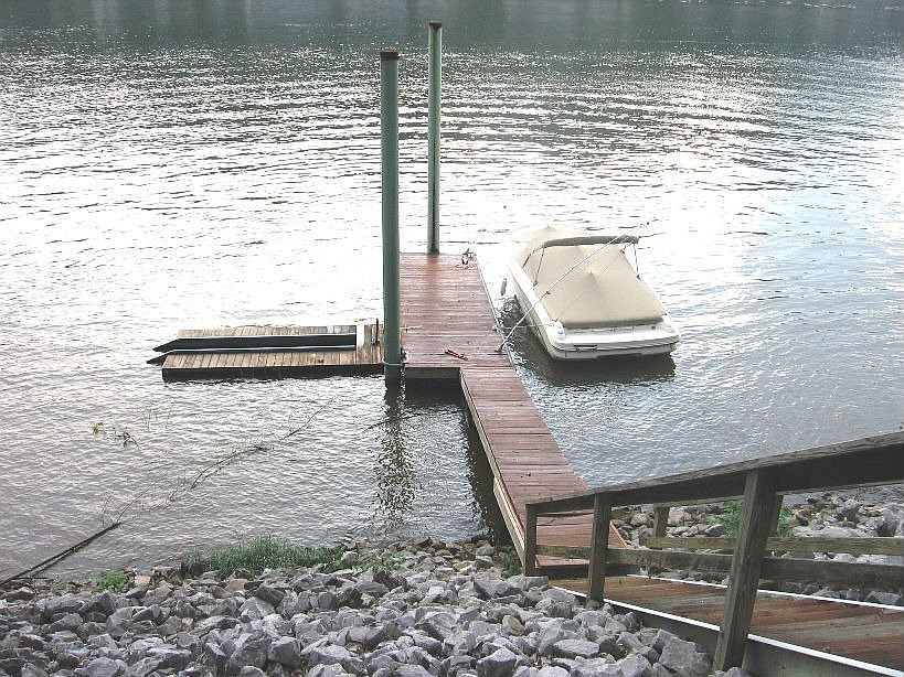 River Lot with dock and jet ski ramp.
