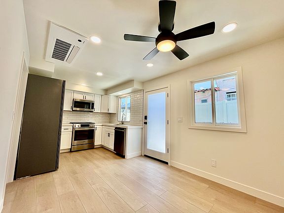 Recessed can lighting throughout entire unit.