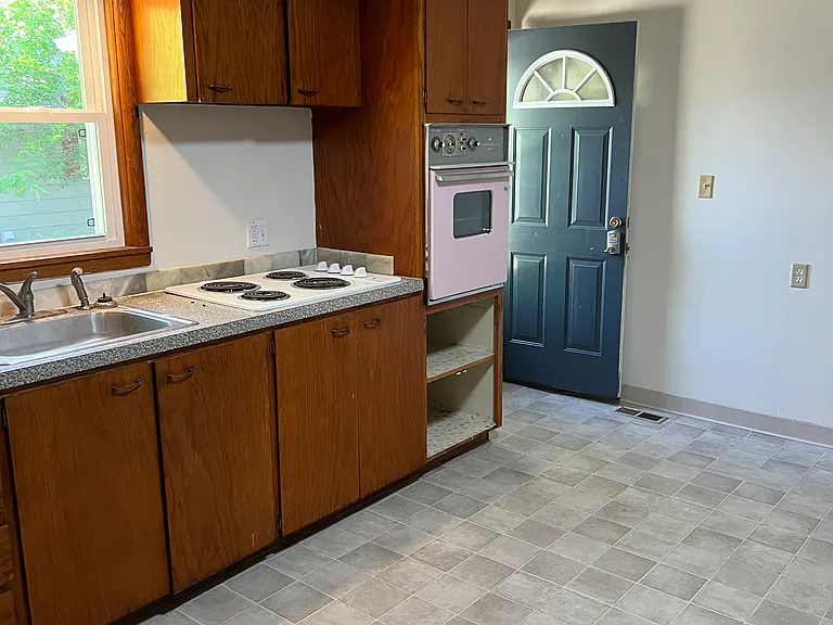 Kitchen with dining area and exterior door access