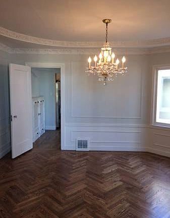 Dining room w/ refinished original hardwood floors