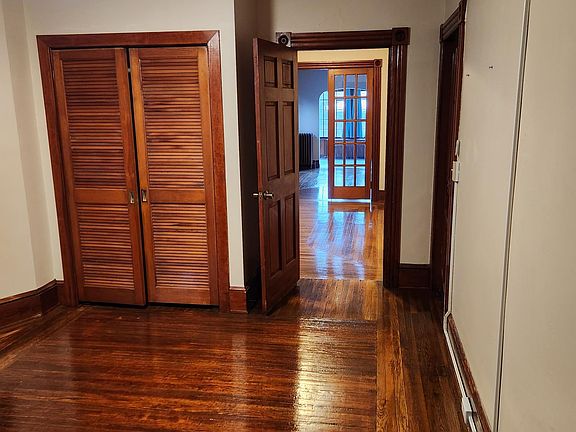 Bedroom & view of the rest of the apartment