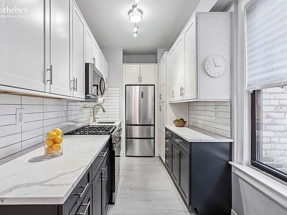 3rd image of 141 E 3rd St APT 10B