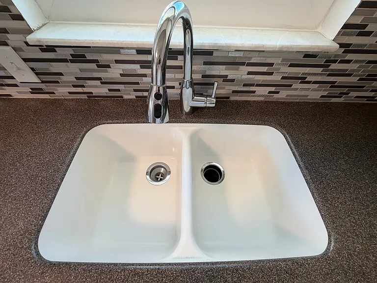 Deep sink with Corian countertops