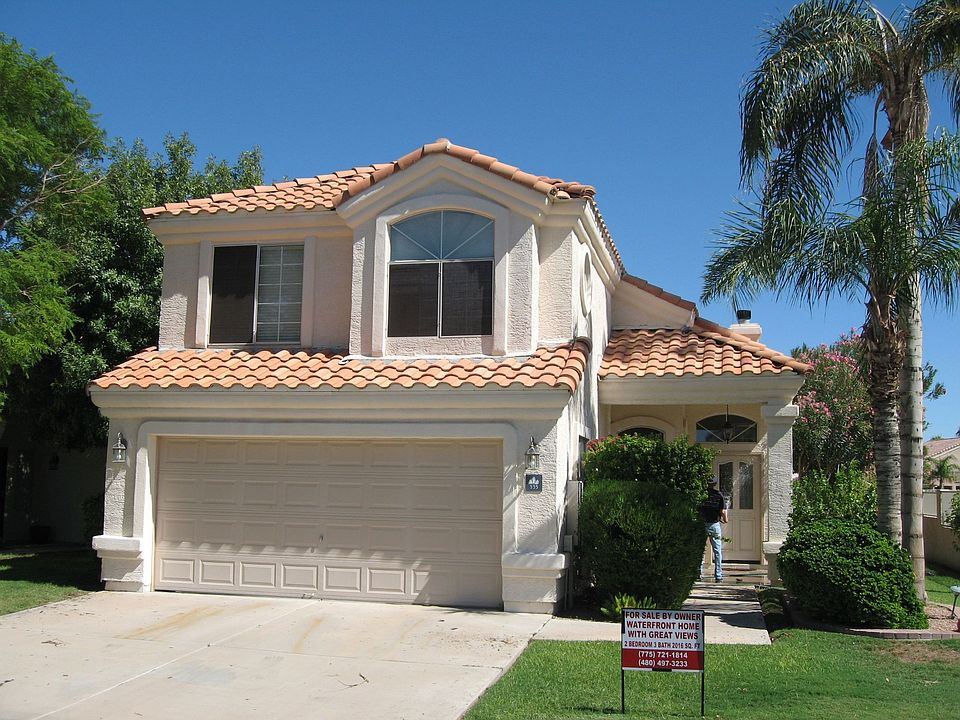 Front of the home as you approach from the gated entry