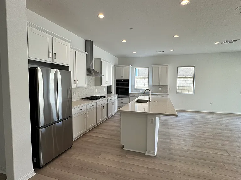 Eat in kitchen at large quartz countertops