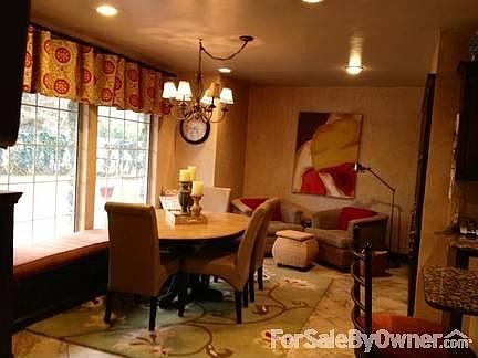 Kitchen View 2
						:
						Sitting nook & kitchen table with built in window seal bench