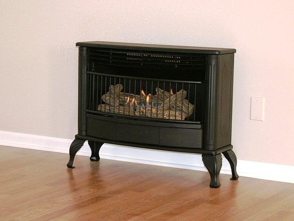 natural gas "wood" stove in LR - new 2013