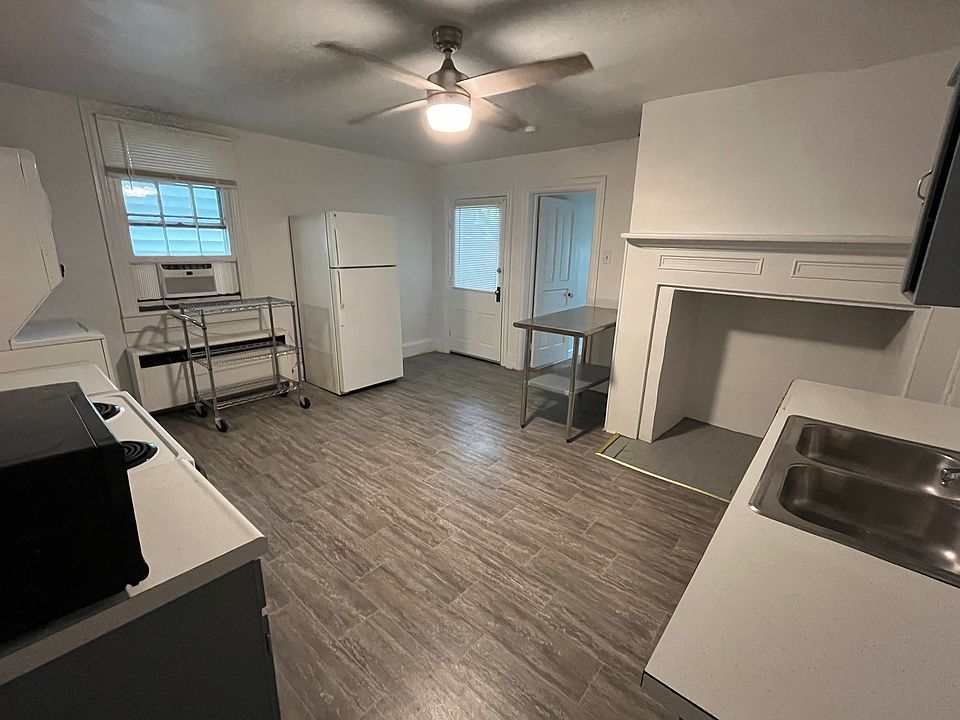 Kitchen with washer and dryer