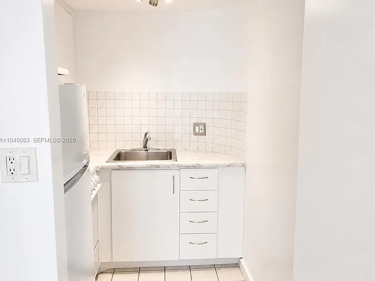 1650 NE 115th St #505 — Photo 8