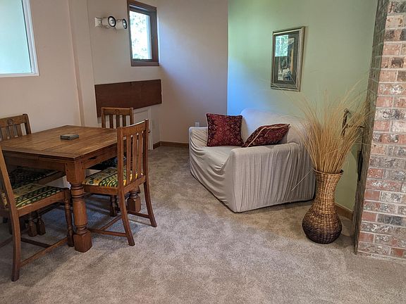 Living/dining area, adjacent to Russian fireplace.