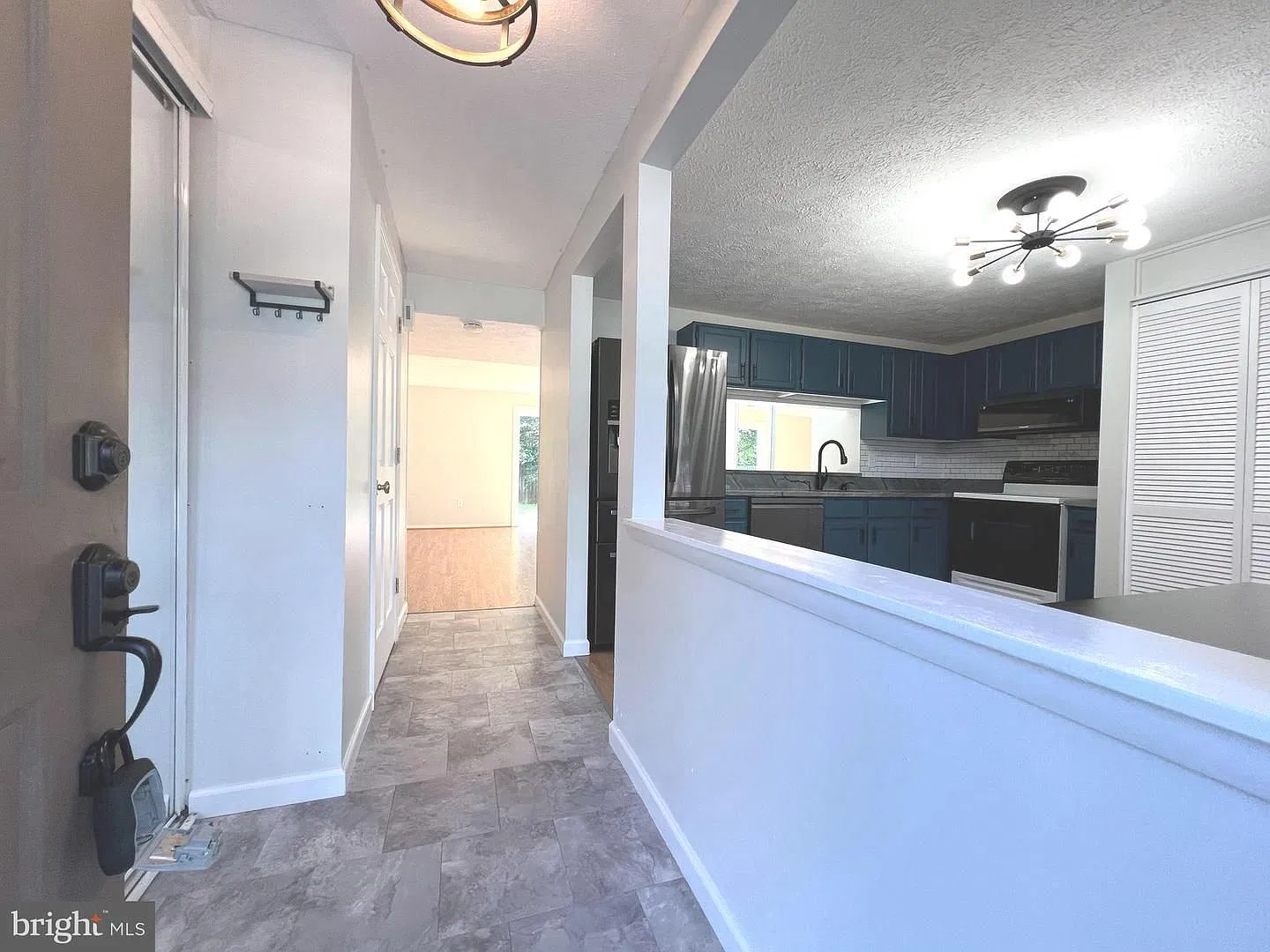 Welcome to this chic 3 bedroom end of group townhome in Queen Anne Village. — Photo 2