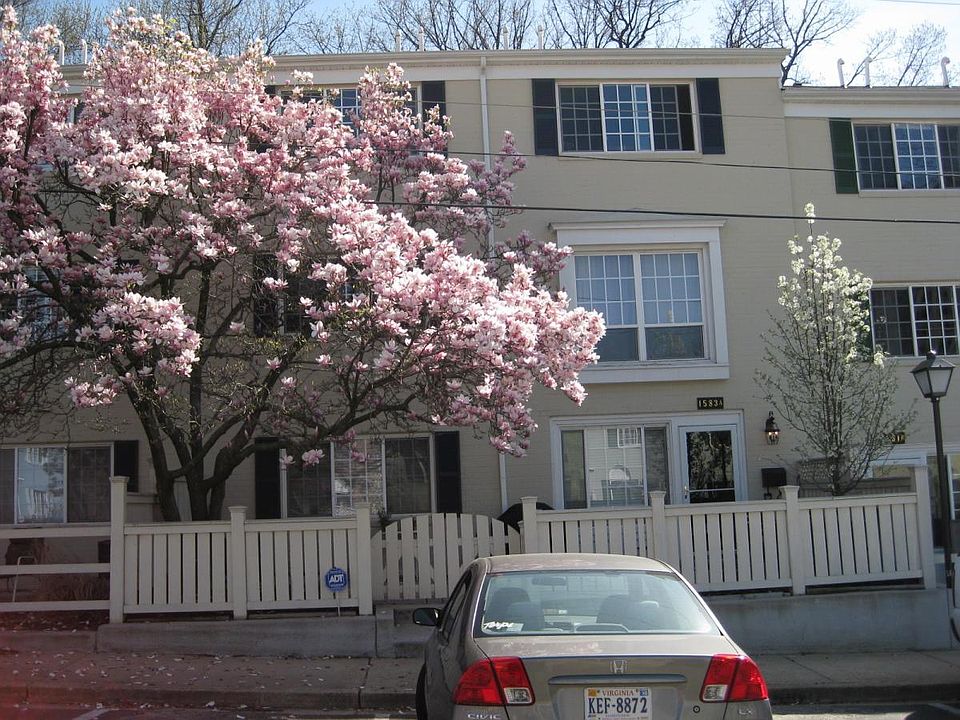 Entry into the unit; fenced and gated patio the length of th